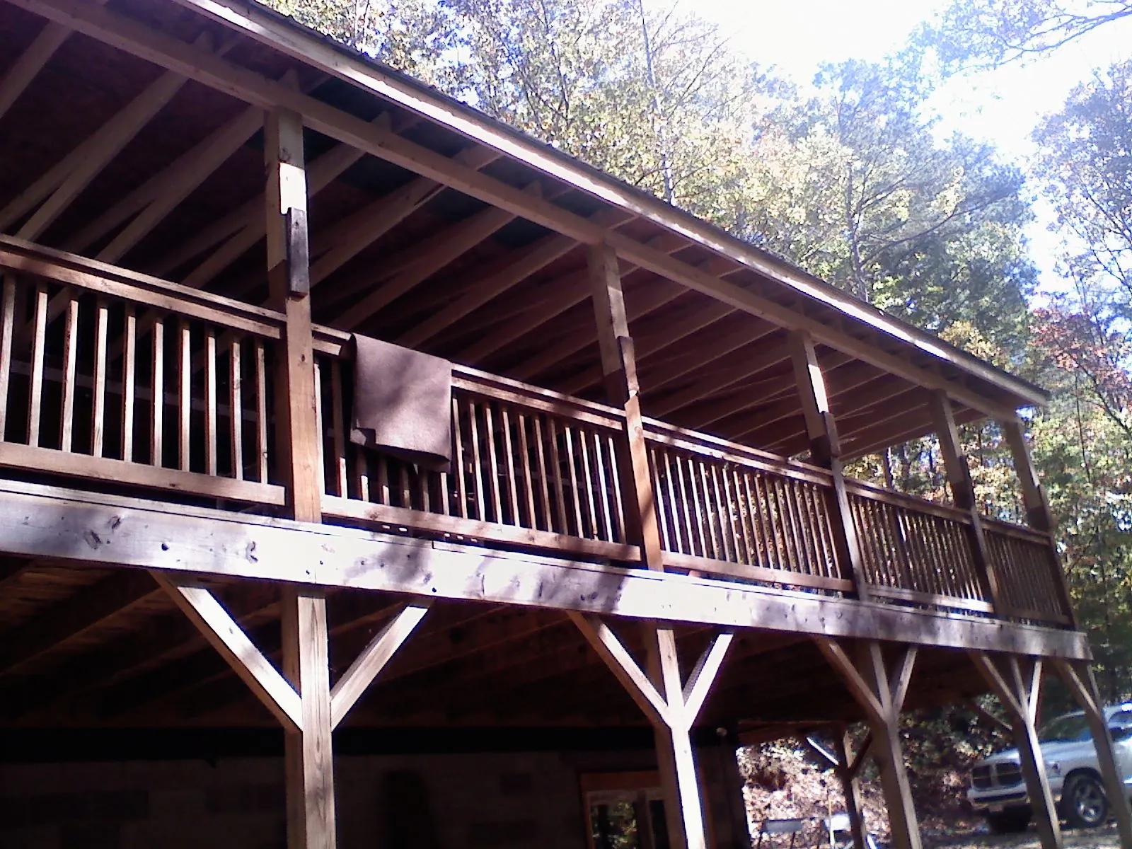 Timber framing under a new elevated porch and deck — Roof Leak Repair in Plush by Roofing Brothers
